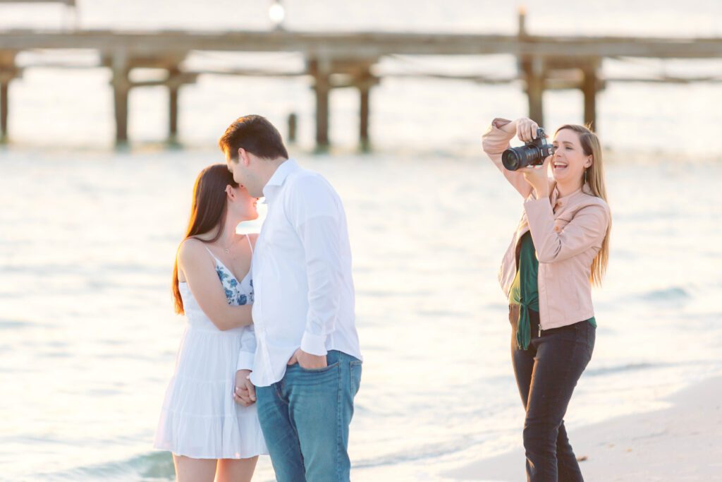 Behind the scenes of Florida Engagement & Wedding photographer capturing an engagement session