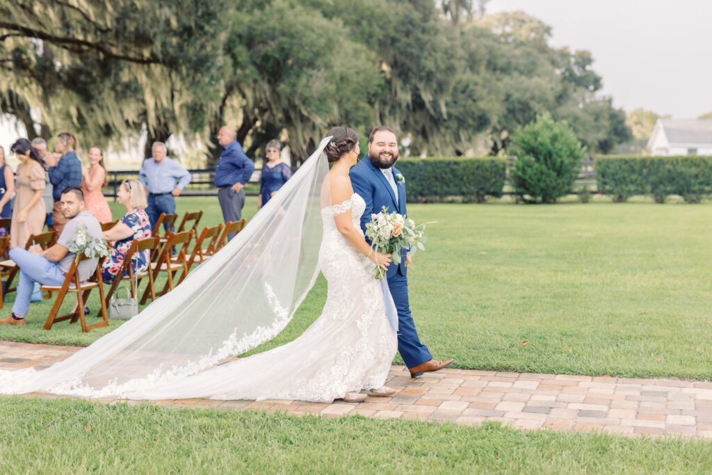 Covington farm wedding ceremony in light misting rain.